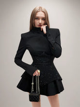Mini-robe noire patchwork à sequins